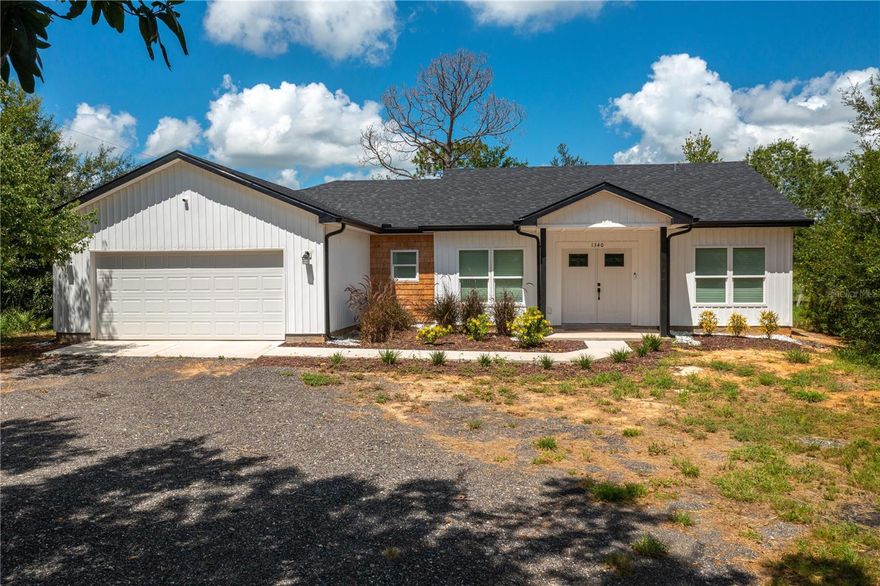 NEW PRICE!!! NO HOA!!  IMAGINE LIVING IN A NEARLY BRAND-NEW 3-bedroom, 2-bathroom, CUSTOM-BUILT HOME ON ONE ACRE!  No neighbors across the street. No rear neighbors.  This is a unique home. A brand-new whole house water filtration system that the current owners had installed, as well as rain gutters, and all of the appliances, including the washer and dryer.  This home has its own private sewer system. The back of the property abuts a 10-acre piece of vacant land. Enjoy a 2-car garage with plenty of storage room.  An inside laundry, open floor plan with very spacious rooms. The kitchen has lots of cabinets, and beautiful quartz countertops. This property has room for a pool, or for whatever you desire to do with it.  The yard is almost a blank slate, so if you want a garden, there's plenty of room for that.  You will enjoy the rural setting, but not too far from Frostproof, Avon Park, Fort Meade, and Lake Wales.  Just an hour and a half from the coastal beaches, as well as the Orlando attractions.  If you want a peaceful setting in a gorgeous home that you will be comfortable in and proud to own, this is your dream home.  Make an appointment now to see this one-of-a-kind property.