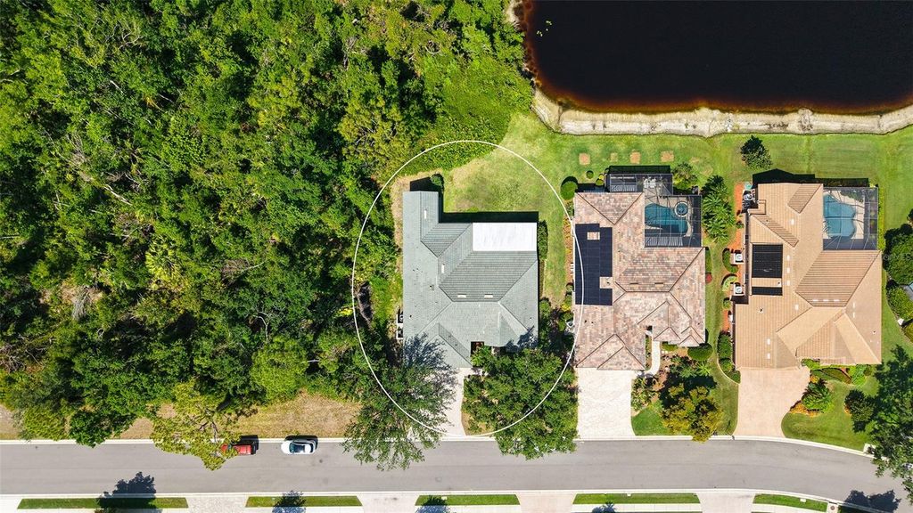 Photo of 4920 Woodhurst Drive, Sarasota, FL 34243 (MLS # A4652676)