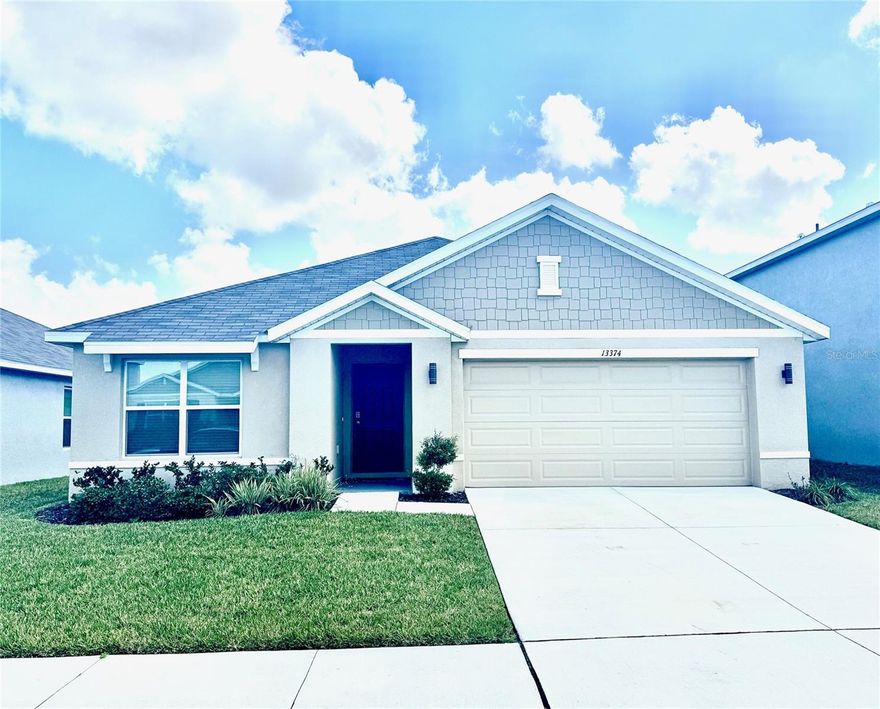 NEARLY NEW AND ONLY USED PART TIME.  This like-new home, built in 2024, is located on a greenbelt lot in Pine Creek of Pasco, a small neighborhood constructed by DR Horton Homes. You will love to open floor plan that shows off the granite-topped kitchen island. Lots of cabinets and stainless steel appliances adorn the kitchen. Eat at the breakfast bar or in the spacious dining area.  The open kitchen has unobstructed view to the living and dining rooms. Neutral ceramic tile is your flooring in all the common area rooms of the house. The bedroom locations are split and the primary bedroom has an attractive en-suite bathroom, dual sinks in the granite counters and you will appreciate the spacious walk-in closet. The covered lanai overlooks the large back yard and the greenbelt area beyond.  The location of Pine Creek provides easy access to the Suncoast Parkway, shopping and the international airport. No flood zone or CDD charges here. Very low HOA fee. There is no need to wait for a house to be built when you can have one that is like new today. The furnishings are available separately. Schedule your appointment to see this one today.