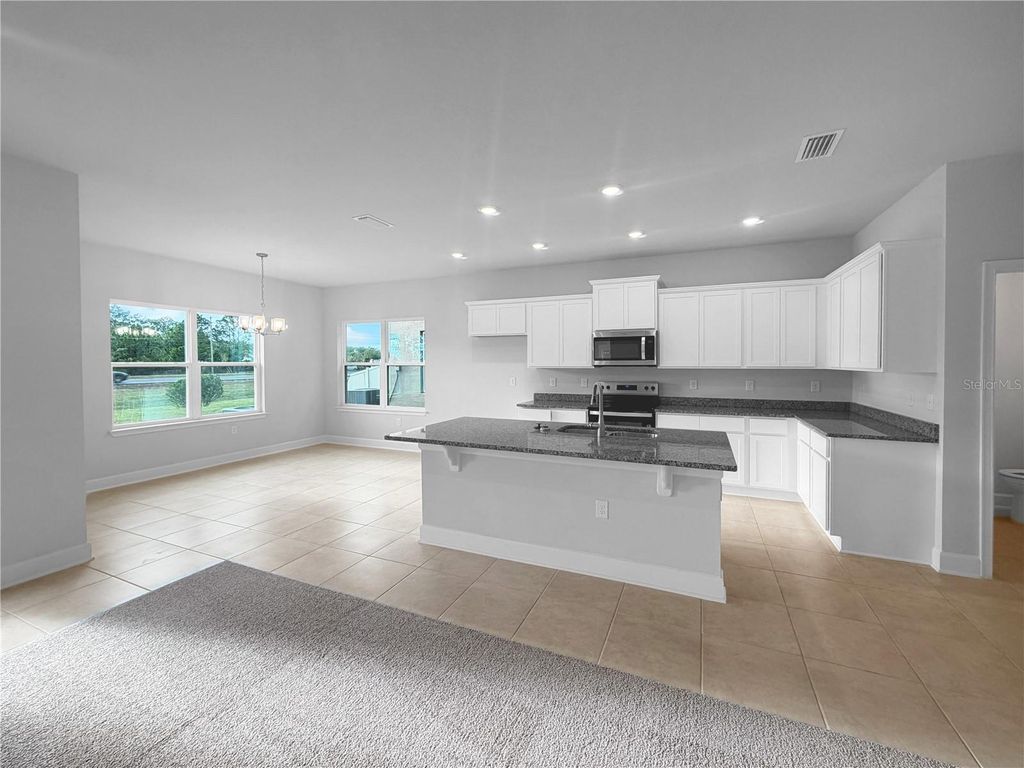 Photo of 7581 Bent Tree Loop, Saint Cloud, FL 34773 (MLS # O6375801)