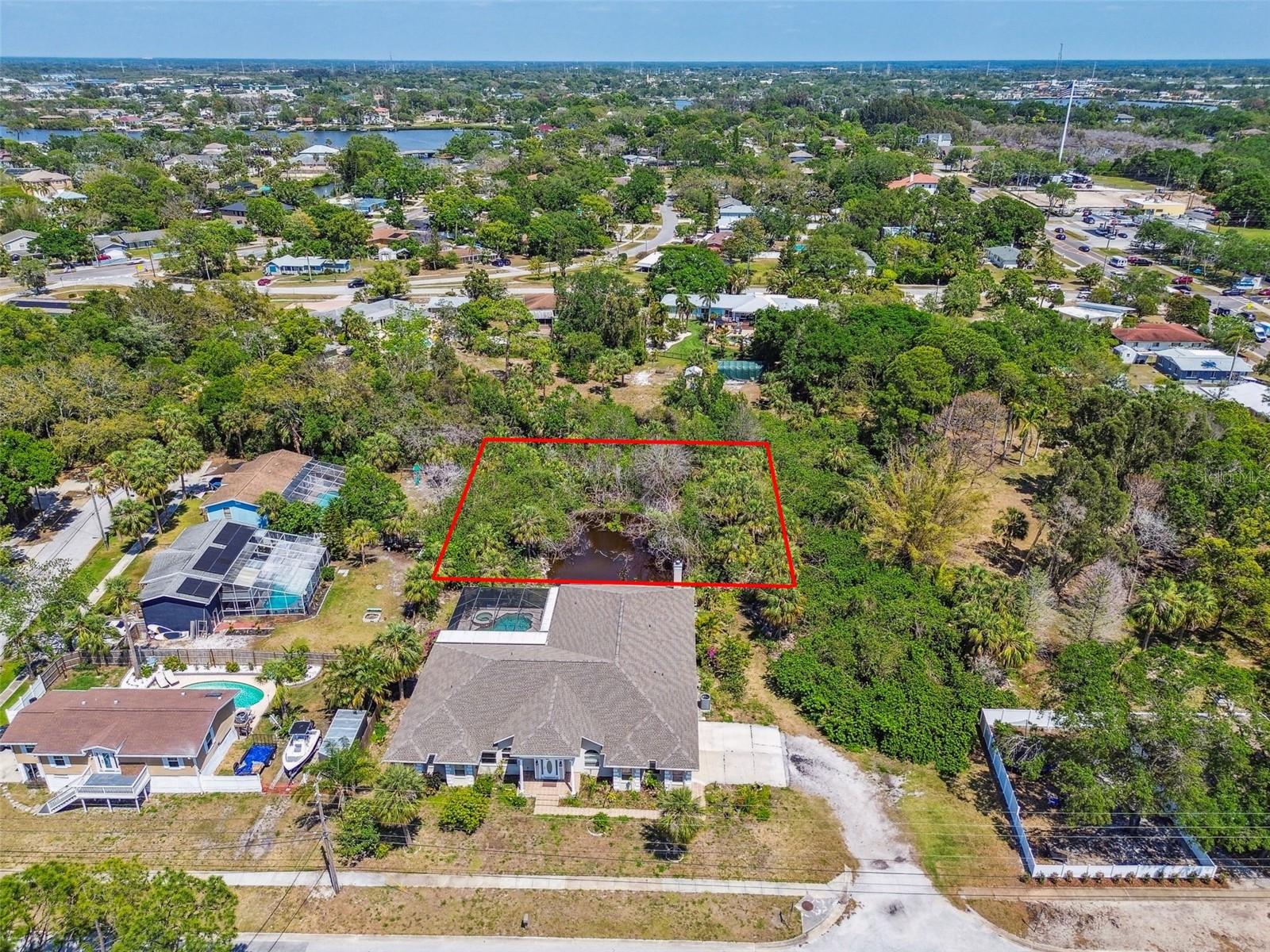 Build your dream home or expand your vision with this spacious vacant lot located just minutes from downtown Tarpon Springs, the Sponge Docks, and Gulf beaches. Nestled in a quiet, established neighborhood with no HOA or CDD fees, this property offers flexible options for residential use, including boat or RV parking.
Adjacent to a 4,440 sq ft home also for sale—purchase together for even more potential, whether you’re looking to create a private compound or add a guest house. Don’t miss this chance to own land in one of Tarpon’s most desirable areas!