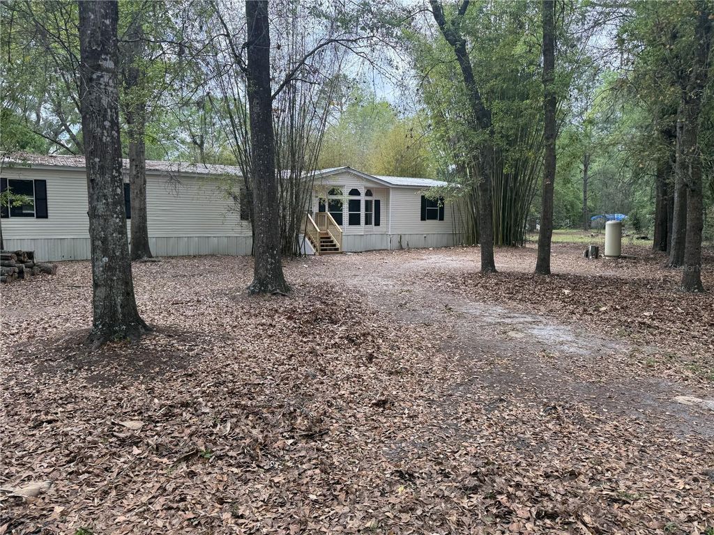 Photo of 5613 NW 202nd Place, Alachua, FL 32615 (MLS # GC539016)