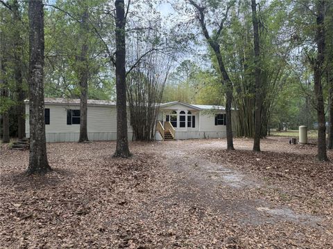 Photo of 5613 NW 202nd Place, Alachua, FL 32615 (MLS # GC539016)