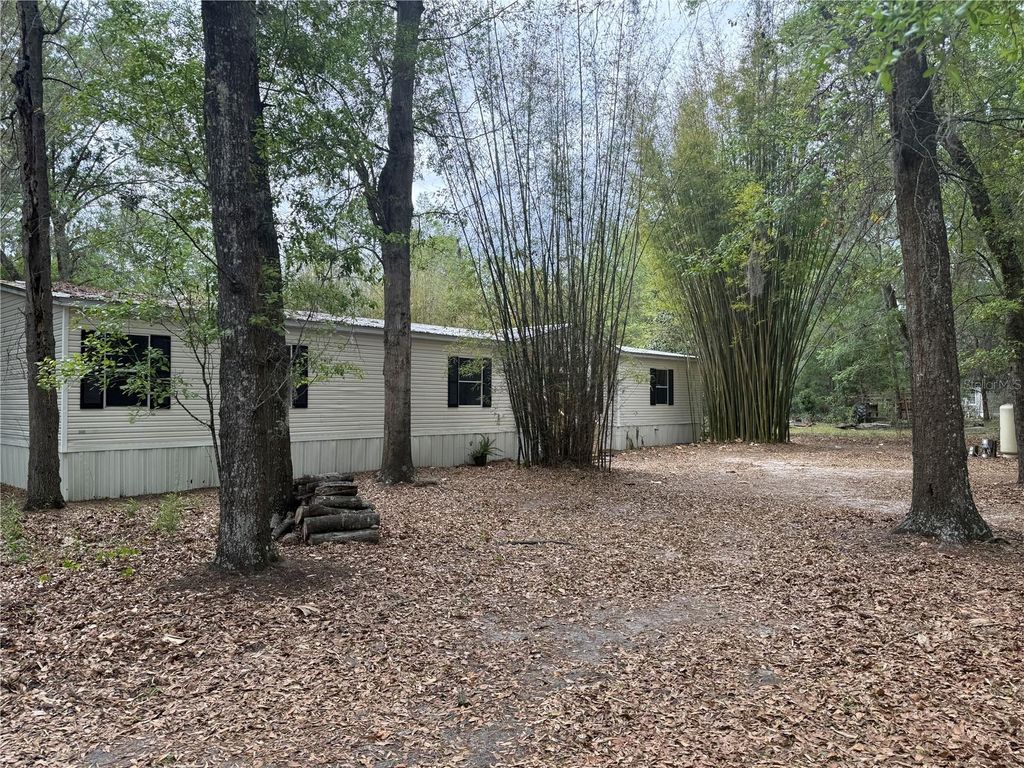 Photo of 5613 NW 202nd Place, Alachua, FL 32615 (MLS # GC539016)