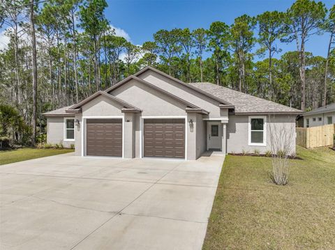 Photo of 44 Regency Drive, Palm Coast, FL 32164 (MLS # FC316649)