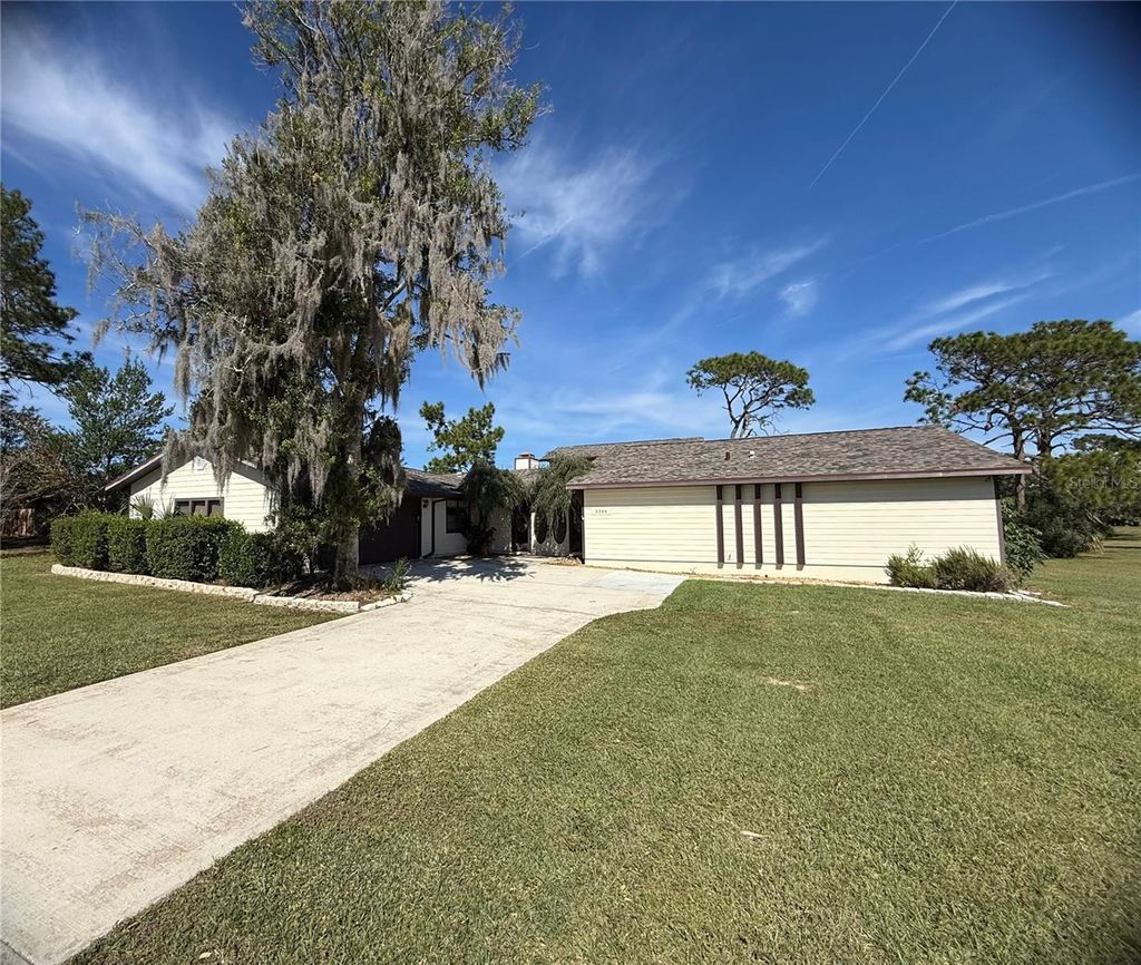 Photo of 5544 Fairway Drive, Ridge Manor, FL 33523 (MLS # TB8446400)
