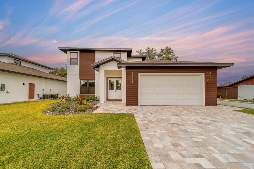 Welcome to your stunning move in ready, new custom-built home—just 1.5 miles from Indian Rocks Beach and located in desirable Flood Zone X! This brand-new two-story residence offers 2,197 square feet of thoughtfully designed living space, featuring four bedrooms, two full bathrooms, and a convenient half bath on the main floor. The spacious primary suite is located downstairs and includes a generous walk-in closet. You'll love the open-concept main floor, complete with soaring 10-foot ceilings, warm oak-finish vinyl flooring, and a large under-stair storage area. The beautifully appointed kitchen boasts white shaker cabinets, quartz countertops, stainless steel appliances, a walk-in pantry, and a bright dining area perfect for gatherings. Step outside to a shaded covered porch—ideal for outdoor entertaining or peaceful relaxation. Upstairs, you'll find three additional bedrooms, all with vinyl flooring and oversized closets. Built with durability and efficiency in mind, the home includes high-impact windows throughout. With no HOA and low insurance rates thanks to its new construction and favorable location, this home is a rare find. Offering $10K credit for buyer upgrades and a 2/1 mortgage buy down. Agent/builder-owned. Don’t miss your chance to own a brand-new home in the sought-after Largo/Seminole area! Interior photos are of staged model home next door. Some finishes are the different, but floor plan is the same.