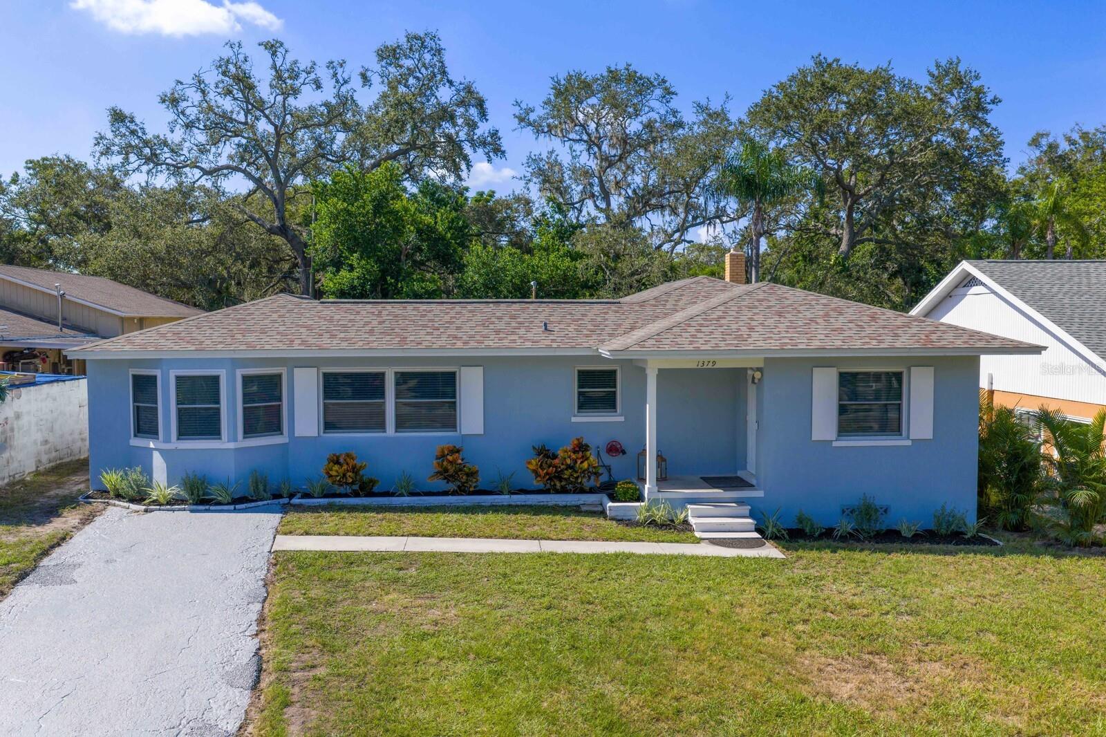 An unbeatable location! Set back from the street on a deep grassy lot, this 4-bedroom, 2-bath Clearwater home offers a thoughtful balance of charm and updates in a quiet neighborhood where the end of the street adjoins Glen Oaks Park and is just 4 miles from world-famous Clearwater Beach.
The main living area is bright and spacious with refinished original wood floors. The renovated kitchen features white shaker cabinetry, quartz countertops, stainless steel appliances, pantry closet and a playful chalkboard wall with a coffee bar - a perfect space to start your day. The dining room includes period built-ins, a wood-paneled ceiling and a large window overlooking the front lawn. Behind the kitchen, a utility room with laundry hookups connects directly to the lanai and spacious backyard.
The primary suite rests on one side of the house for added privacy and includes dual closets, an updated ensuite with glass-enclosed shower, modern vanity, new lighting and a dressing counter. A door from the ensuite opens directly to the lanai for convenient outdoor access. Three additional bedrooms share a full hallway bath with vintage green tile, white floor tile, a black light fixture with Edison bulbs and an updated black faucet and hardware.
The backyard is already a comfortable retreat, with a lanai for outdoor living and a grassy area framed by a backdrop of trees. It’s a versatile setting for gatherings, lawn games, or quiet evenings at home and still offers plenty of opportunity to shape your own ideas in the future. A storage shed provides convenient space for tools and equipment.
The location combines neighborhood quiet with everyday convenience—just 1 mile to Clearwater Plaza with Publix and restaurants, minutes to Highland Plaza, and easy access to FL-60 for direct routes to downtown Tampa and the airport.
PVC Exterior Plumbing (2025), Roof installed 2018, Water Heater installed 2024 with 6 yr warranty and HVAC installed 2021 with warranty thru 3/19/2026. See VIRTUAL TOUR link for full walkthrough.