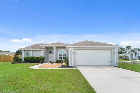 Photo of 9110 Flagstick Lane, Hudson, FL 34667 (MLS # TB8521114)