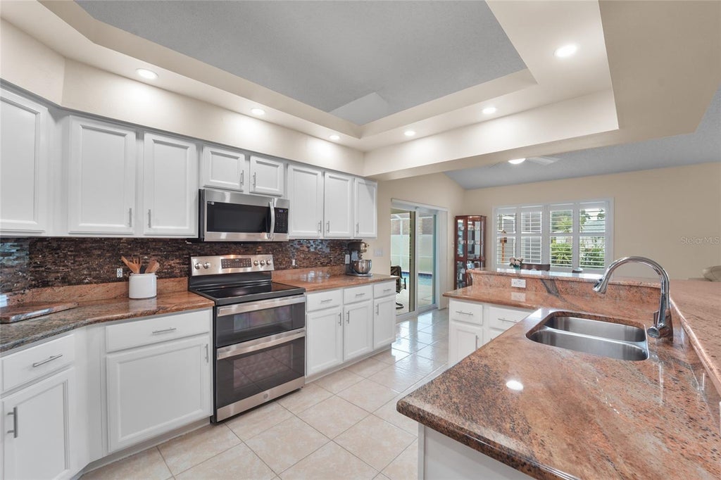 Photo of 9110 Flagstick Lane, Hudson, FL 34667 (MLS # TB8521114)