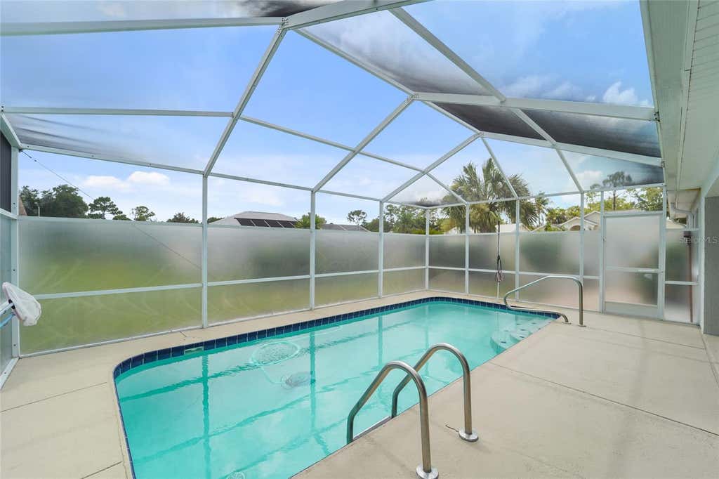 Photo of 9110 Flagstick Lane, Hudson, FL 34667 (MLS # TB8521114)