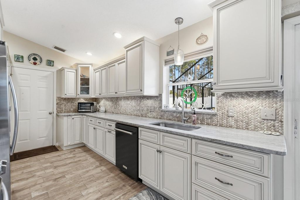 Photo of 78 Breeze Hill Ln, Palm Coast, FL 32137 (MLS # FC314295)