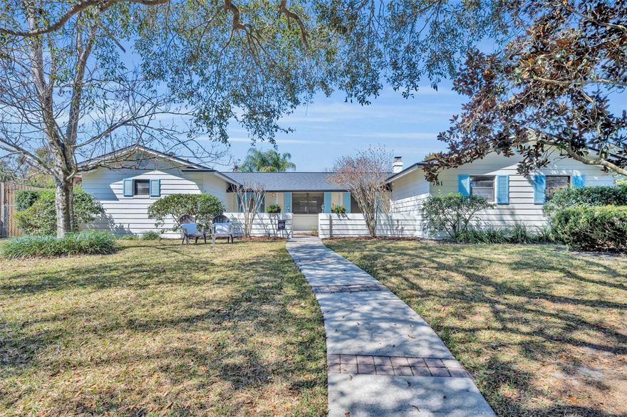 Exclusive Dommerich opportunity to own a true 5 Bedroom, 3 Bath home PLUS a dedicated office—an almost impossible combination to find in this celebrated neighborhood. Situated on a quiet, private-feeling cul-de-sac on over 1/3 acre, this home offers space, function, and timeless charm to love for years to come. This enclave of Dommerich is special - with neighbors often gathering and enjoying afternoons in Adirondack chairs neatly situated in front lawns, thanks to the serene nature of the streets. Even more charm is found in the front exterior of this home, which includes a front courtyard, perfect for gardening or a cup of coffee in the morning. Inside, the flexible floorplan includes formal living and dining rooms on the same wing as the primary retreat, plus a spacious den/office overlooking the pool on the opposite side of the home. The cozy family room features a fireplace and built-ins, and opens to a well-designed kitchen with granite counters, stainless steel appliances, bar seating, and a functional breakfast nook. Durable wood-look tile runs through the kitchen, family room, and roomy den for easy maintenance and enjoyment for years to come! Newer sliders provide great views and access to the sparkling pool from the den that could also make a great office or play space. The split bedroom layout provides privacy, with the primary suite in its own wing featuring a large walk-in closet, dual sinks in the renovated bathroom, and a spacious size that makes this suite truly feel like a retreat. On the guest bedroom wing of the home, the first two bedrooms share a remodeled Jack-and-Jill bathroom with each also having walk-in closets (yes, WALK-IN CLOSETS in guest bedrooms!). Bedrooms 4 and 5 share the 3rd Bathroom (ALSO REMODELED) that can easily function as a pool bath thanks to the tile floors that seamlessly flow through the guest hall. Storage abounds in this home with multiple hall closets, an indoor laundry room, plus an oversized garage for any sports or recreation equipment.  Enjoy Florida living in the 20,000+ gallon pool with an expansive paver deck that extends along the side yard for additional entertaining space. This great backyard is low-maintenance thanks to the beautiful pavers, but a secluded yard space was saved for outdoor recreation or just enjoying the Dommerich neighborhood! Ideally located just across from top-rated Dommerich Elementary and Maitland Middle, savor a leisurely walk or bike ride to school daily. The home is also zoned for Winter Park High School! All easily accessible from Dommerich is Maitland Community Park featuring walking trails, fitness classes, and tennis; Maitland City Centre, known for its restaurants and festivals; renowned Winter Park and Park Avenue; and smooth access to all of Central Florida via nearby I-4. Move-in is easy thanks to major updates, including a full Roof Replacement in 2023, new exterior paint, an AC Replacement in 2021, a Replumb with PEX lines, sewer lines already connected with NO assestment fees, and no HOA. Don't miss this hard-to-find 5 Bedroom Dommerich home - you might be waiting YEARS for another chance like this!