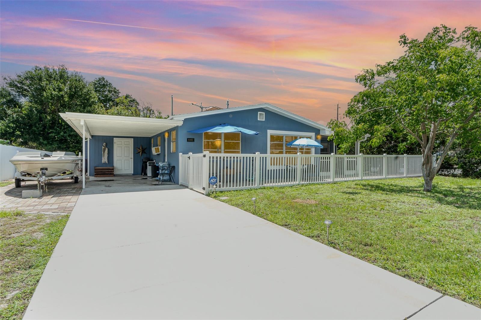 MOTIVATED SELLER! Nestled at the tranquil end of a desirable street in Fort Myers, this charming 2-bedroom, 2-bathroom home is an absolute gem, offering an unparalleled blend of comfort, convenience, and potential! Imagine living in a centrally located home that puts you minutes from everything you desire. Step inside and discover an inviting open floor plan bathed in natural light, featuring elegant hard-surface floors throughout for easy maintenance and a touch of modern sophistication. The spacious layout provides incredible flexibility, offering the ability to create a 3rd bedroom or a versatile den with a little work and creativity to suit your lifestyle needs—a perfect space for a home office, a creative studio, or an extra guest room. Your outdoor space includes a screened-in lanai, and a great fenced-in yard provides a private oasis for relaxation, play, and entertaining. Enjoy peace of mind with a new roof installed in 2022, ensuring years of worry-free living. For those seeking even more space, the existing carport presents a fantastic opportunity to convert it into a secure garage, adding value and functionality to your home. All this with location, location, location! This property boasts an unbeatable spot, placing you within a stone's throw of top-rated schools, the vibrant downtown Fort Myers scene, and the historic McGregor Corridor. Commuting is a breeze with proximity to Cape Coral Parkway bridge, connecting you to all the charm of Cape Coral in minutes. And for those sun-drenched days, the stunning beaches are just a short distance away, offering endless opportunities for relaxation and recreation. Everyday conveniences are at your fingertips with an abundance of shopping, dining, and healthcare options nearby, along with readily available public transportation. This isn't just a house; it's a lifestyle! Don't miss this incredible opportunity to own a piece of prime Fort Myers real estate with endless possibilities. Schedule your private showing today with your favorite Realtor and start envisioning your future in this fantastic home!
