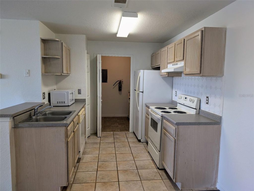 Photo of 8915 Latrec Avenue #2-212, Orlando, FL 32819 (MLS # O6380563)