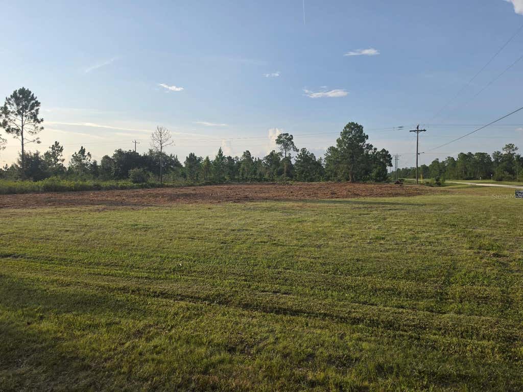 Photo of 402 Japonica Drive, Indian Lake Estates, FL 33855 (MLS # TB8535611)