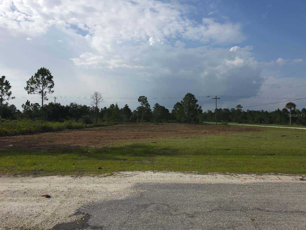 Photo of 402 Japonica Drive, Indian Lake Estates, FL 33855 (MLS # TB8535611)