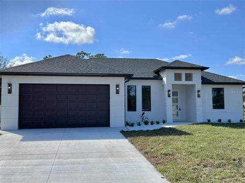 Photo of 2913 Woodward Avenue, North Port, FL 34286 (MLS # C7518617)