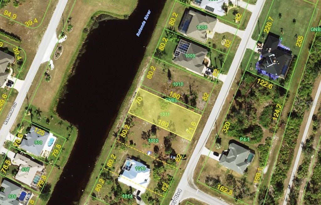 Photo of 964 Boundary Boulevard, Rotonda West, FL 33947 (MLS # D6142260)