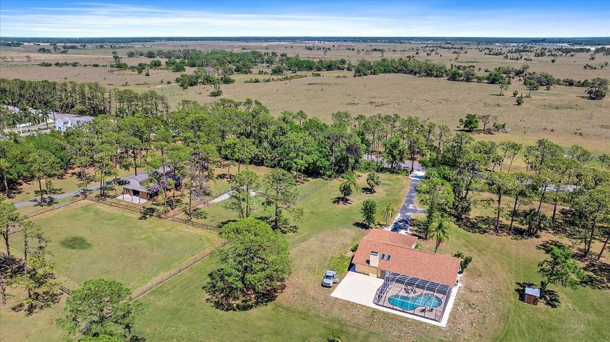 Family Compound & Hobby Farm Opportunity on 20 Acres - Endless Possibilities Await! No HOA, no deed restrictions, and endless freedom to live your dream lifestyle. Welcome to 8280 Ibis St, Sarasota FL 34241 - an exceptional 20-acre property offering the perfect blend of privacy, functionality, and location. Ideal for those seeking a family compound, hobby farm, private retreat, plant nursery, or veterinary facility, this unique estate includes four single-family homes—one with an in-law suite—plus two barn apartments and a caretaker suite, totaling eight separate living spaces. Whether you're looking to create a multi-generational haven, a weekend escape, or a lifestyle property for farming, recreation, or income-producing ventures, this land offers it all. With two large barns, 20+ stalls, eight paddocks, a round pen, riding arena, and a climate-controlled tack room, it’s perfectly suited for horse lovers—but just as easily adapted for ATV trails, gardening, livestock, nursery operations, veterinary use, or creative homesteading. Enjoy peaceful seclusion while staying close to everything—just 3 Miles to I-75 Clark rd. exit , 20 minutes to Siesta Key Beach, 25 minutes to downtown Sarasota, and within walking distance to a semi-private golf course. This is secluded and tranquil living without sacrificing convenience. Build your dream home with sweeping views, explore nature, or simply enjoy the space to roam and breathe—this is a rare chance to own a versatile estate in a highly desirable location. Don’t miss this one-of-a-kind property with unlimited potential for family, business, and future growth!