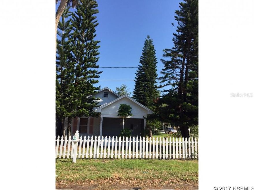 INVESTOR ALERT!!!!!!! Catch a glimpse of the river from the front yard of this house. This is a fixer upper or tear down....your choice! Very large corner lot in very desirable Riverside Drive area....own your own little piece of NSB paradise! ;Water: City