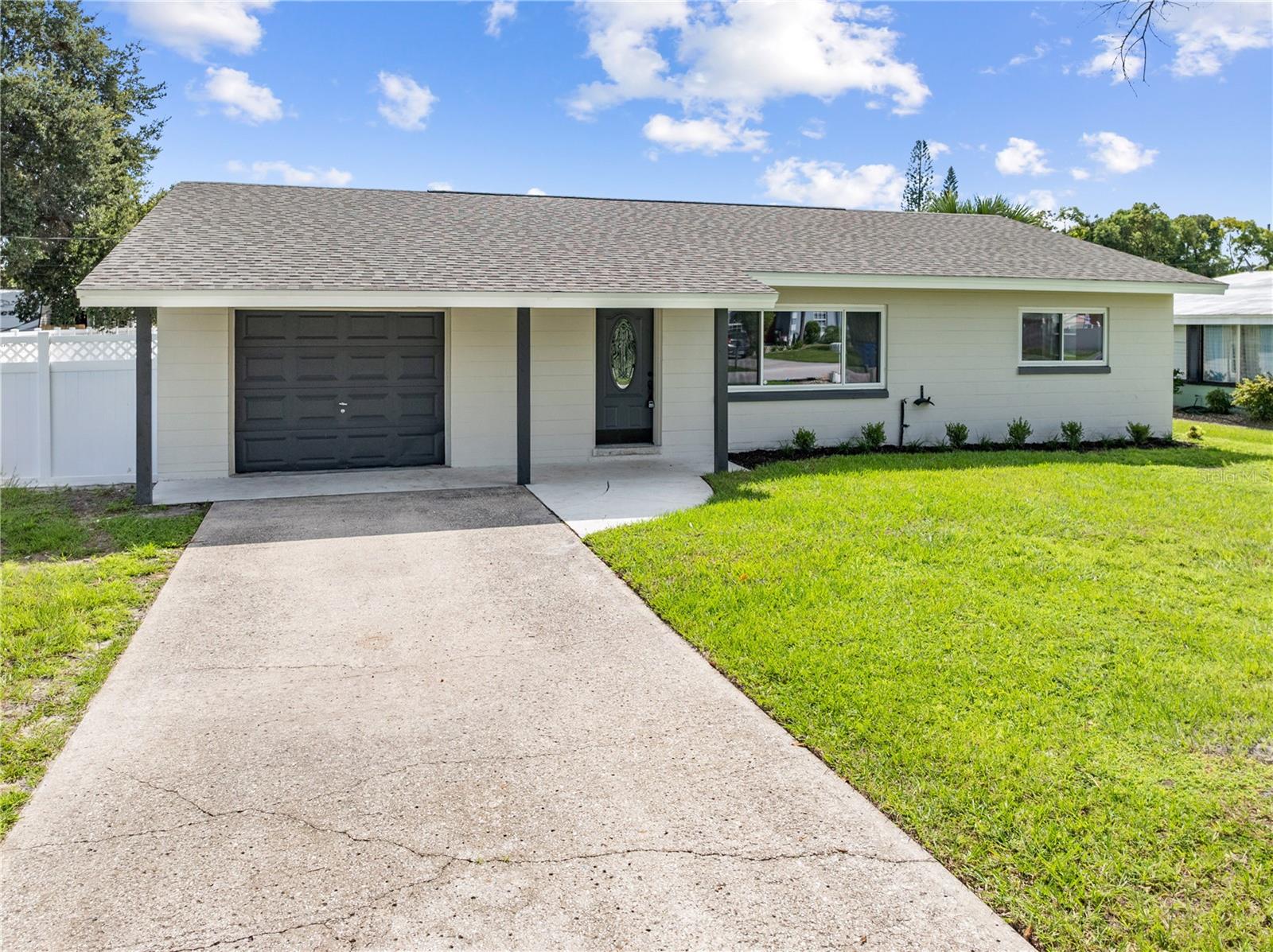Beautifully Updated 3 Bedroom, 3 Bathroom Pool Home!
Step inside to find fresh interior and exterior paint, brand-new flooring, and a Brand New kitchen featuring custom cabinets, solid surface countertops, and stainless steel appliances. Major updates include a brand-new roof, newer A/C and water heater, and updated windows for peace of mind. This home offers a versatile floor plan with a Florida room, additional office space, and an indoor laundry room with plenty of storage. The single car garage offers another space to store your things out of the weather or park your car! Outside, enjoy your private backyard with vinyl fencing and an in-ground swimming pool surrounded by a brand-new paver deck—perfect for entertaining or relaxing. Conveniently located near beaches, airports, and Orlando’s world-famous theme parks. Don’t miss your chance to own this move-in-ready home!