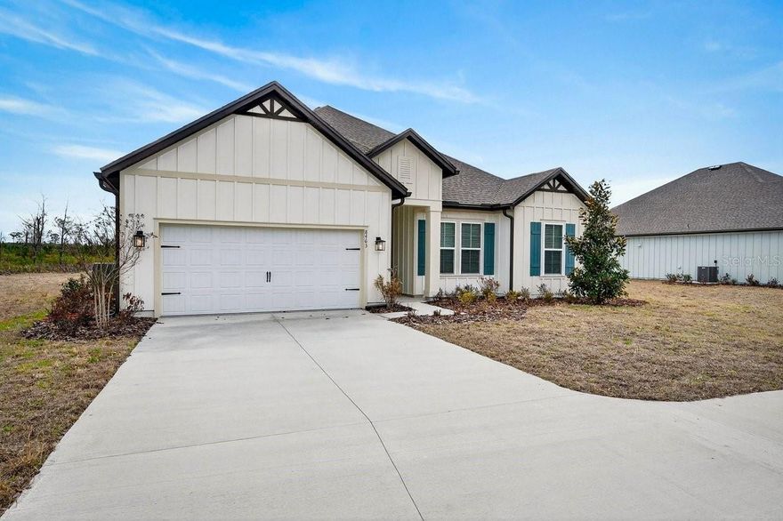 Welcome to 8463 Ford Rd, located on a sprawling acreage homesite in the sought-after Stables at Cary Forest. This beautifully designed home features the popular Leland floorplan with 4 bedrooms, 2 bathrooms, and a layout that blends everyday functionality with upscale finishes. From the moment you arrive, the property stands out with over 100 feet of driveway space and a 45-degree side driveway, offering exceptional ease for parking and maneuvering--allowing you to back in and pull straight out toward. From the moment you step through the front door, you're welcomed by a spacious foyer that opens into an expansive main living area. Anchored by a designer kitchen, a large family room, and an open dining space, this home was crafted for everyday living and effortless entertaining. With four generously sized bedrooms and two full bathrooms, the Leland offers ample space for families of all sizes. Blinds are already included, making this home even more move-in ready.

Step outside to a covered rear porch with electric and cable outlets already installed, creating the perfect setup for outdoor entertaining, game days, or relaxing evenings. Garage comes already updated with epoxy flooring. Water softener already install for your convenience. Additional exterior and maintenance features include gutters already installed, a termite bond, sprinklers in flower beds, and Bahia grass.

One of the most valuable features of this property is the land itself: NO WETLANDS -- all buildable land (buyer to verify), giving you more flexibility and usable space on your acreage homesite.

If you've been looking for a newer home with space, upgrades, and a highly usable homesite, 8463 Ford Rd delivers a rare opportunity in Stables at Cary Forest.