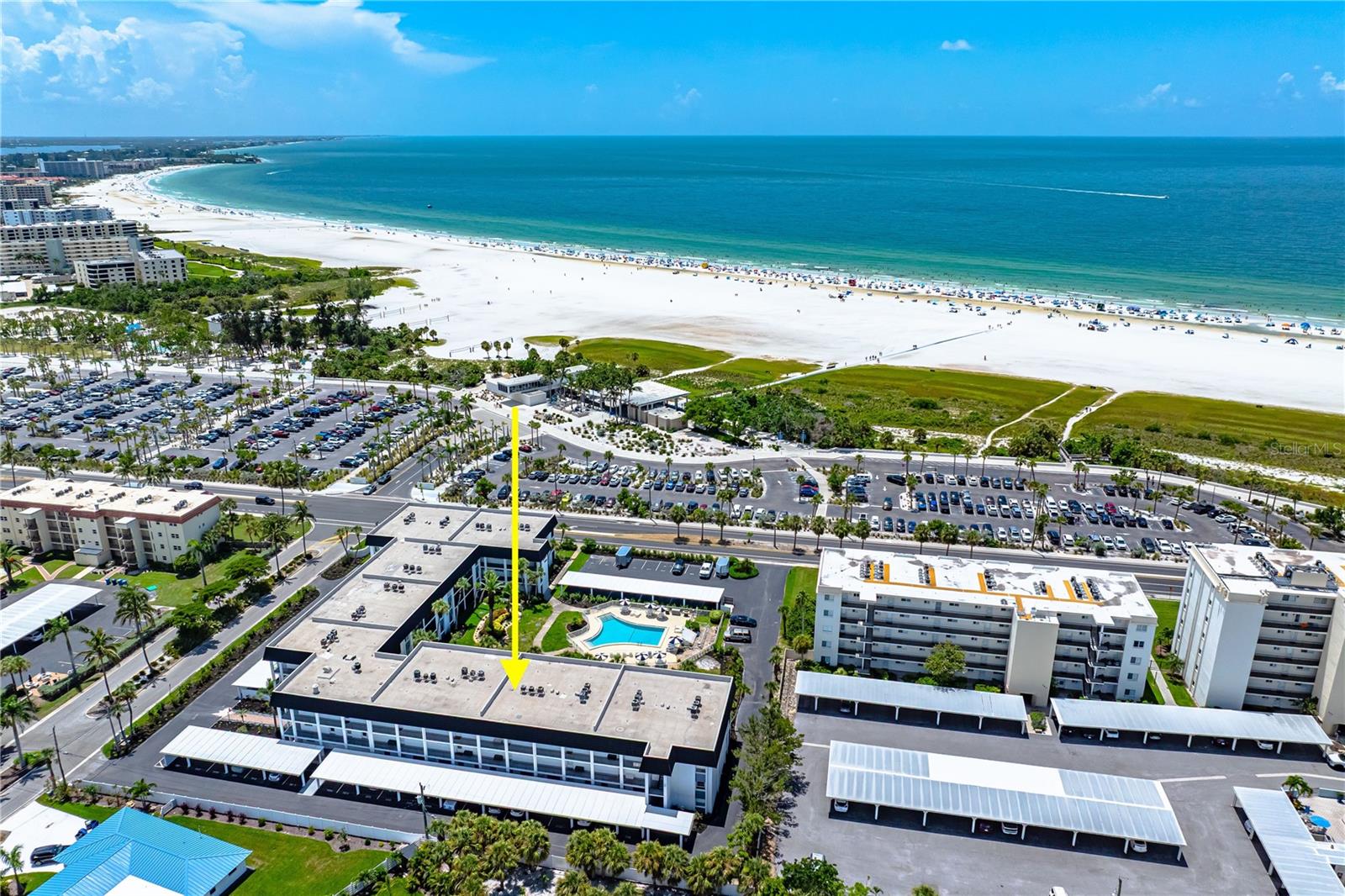 Top-Floor Gulf View Retreat Where Coastal Comfort Meets Modern Living This fully renovated, top-floor condo in the heart of Siesta Key offers panoramic Gulf views and a lifestyle of laid-back luxury with income potential. Featuring an open-concept layout with expanded sliders and raised ceilings, this 2-bed, 2-bath gem is designed for modern living and effortless entertaining. The updated kitchen showcases a large one-level island, granite countertops, stainless appliances, and custom wood cabinetry. Enjoy easy-care wood plank tile throughout (even the lanai), updated baths, crown molding, plantation shutters, and no popcorn ceilings. NEWER AC & HWH in 2021. Hurricane protection adds peace of mind. Relax on your lanai with southern exposure. No harsh west sun, just Gulf breezes and vibrant skies. Coveted covered parking is just outside the elevator. With one-month rentals allowed 12x/year, this fully furnished condo is ideal as a seasonal escape or an income-generating asset. Live the Siesta Key dream today.