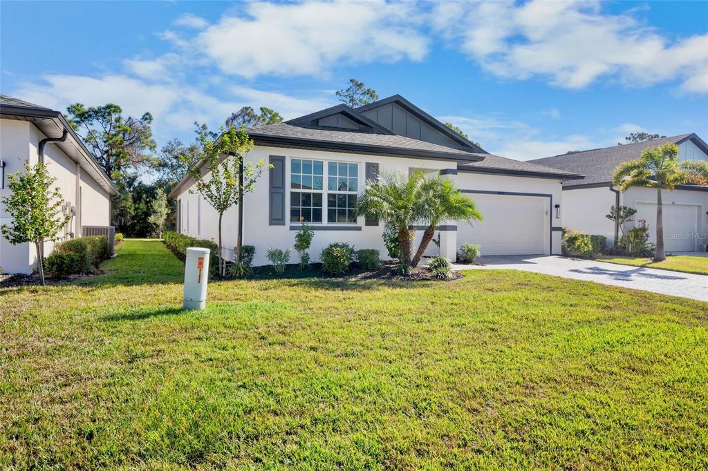 Photo of 1848 Sunset Preserve Way, Port Charlotte, FL 33953 (MLS # A4676075)