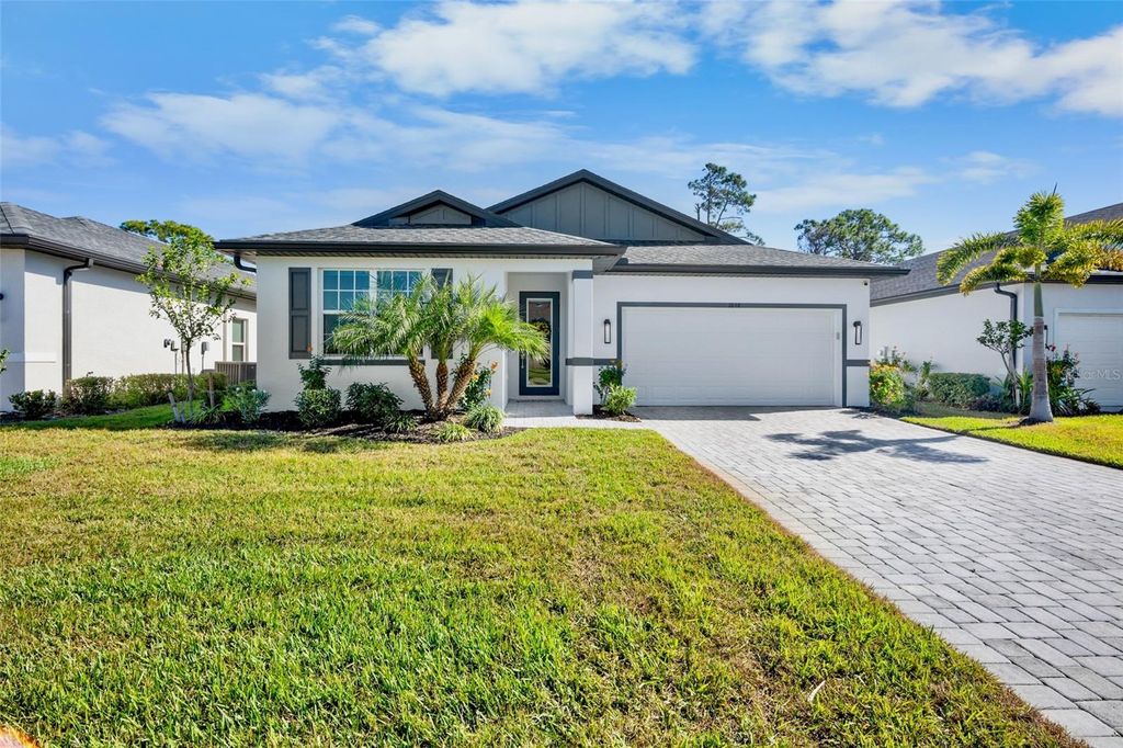 Photo of 1848 Sunset Preserve Way, Port Charlotte, FL 33953 (MLS # A4676075)