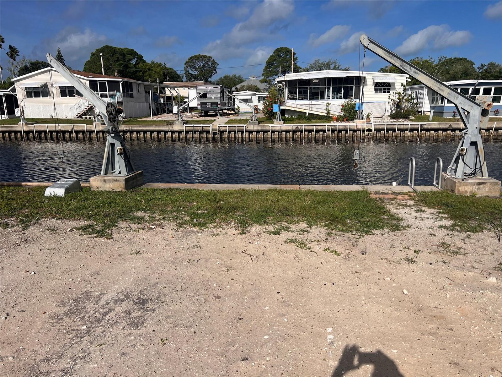 ONE LOT - Beautiful waterfront lot in highly sought after Crystal Bay community - come make your home and begin enjoying all this community has to offer - PLUS beautiful sunsets nightly are free!
