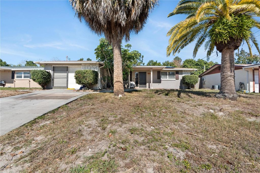 Photo of 7207 Country Club Drive, Hudson, FL 34667 (MLS # TB8471401)