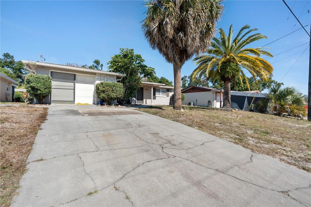 Photo of 7207 Country Club Drive, Hudson, FL 34667 (MLS # TB8471401)