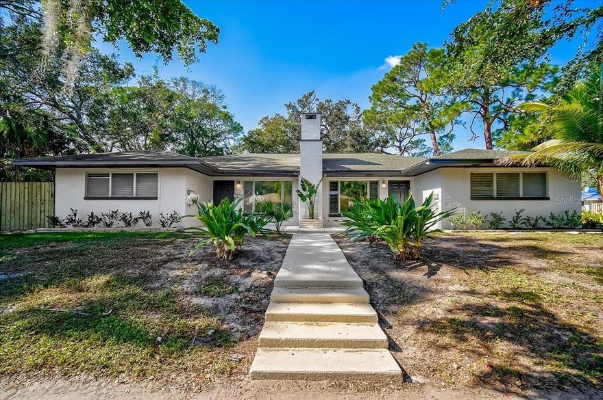 One or more photo(s) has been virtually staged. Renovated Triplex close to the Central Cocoanut Historic District and downtown Sarasota! This 2-bedroom unit is a spacious with 1 bathroom and a rear screened patio. The large living room features a decorative fireplace, a large picture window, and modern lighting. A new modern kitchen with stone countertops, custom cabinetry, matching appliances, and an island with lots of storage makes cooking and entertaining easy. There are two large bedrooms with ample closet space and a bath with dual sinks, solid surface countertops, walk-in shower, and built-in storage. This unit has its own carport and a private laundry/utility room with included washer/dryer and extra sink. Other features include upgraded lighting, ceiling fans, vinyl flooring, hurricane impact windows and wood blinds. Don't miss this opportunity to live near all that Sarasota has to offer with a 5-minute walk to downtown and short drive to St. Armand’s Circle, Lido Beach and tons of restaurants, shopping and entertainment. Water/sewer, pest control, trash collection and grounds maintenance is include in rent. One adult dog under 60 lbs is permitted with a refundable $300 pet deposit. No aggressive breed dogs allowed. No puppies allowed. Advanced rent (last months rent) is being waived for qualified tenants.