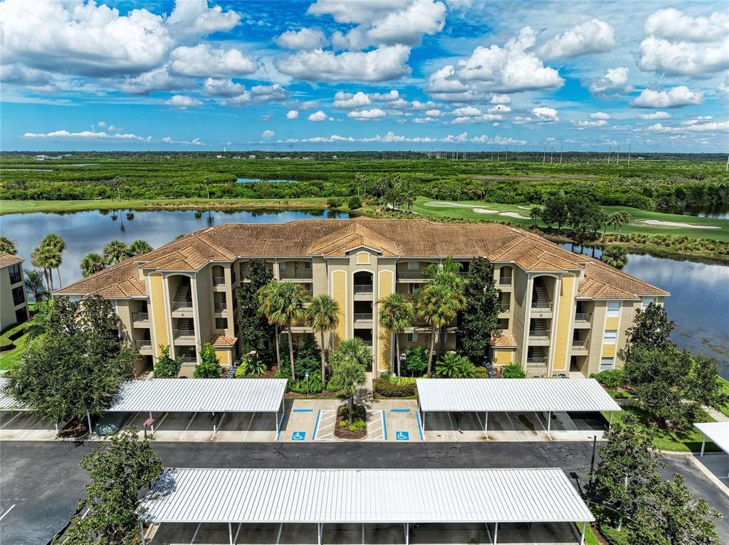 Photo of 7911 Grand Estuary Trail #108, Bradenton, FL 34212 (MLS # A4664378)