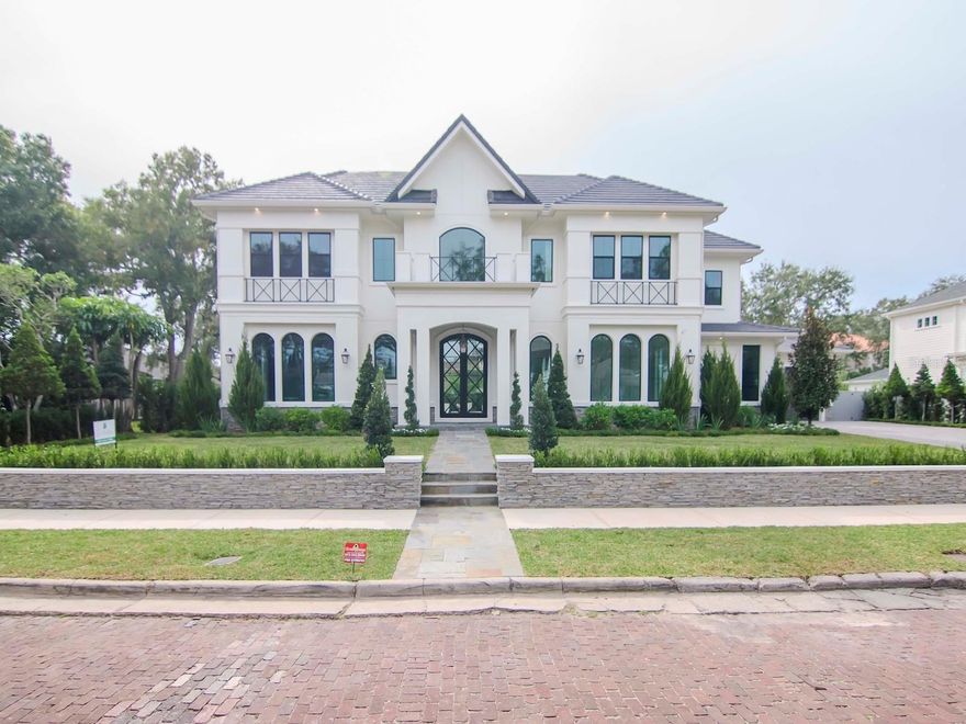 Introducing Taralon Homes newest creation located in the coveted Golf View Estates. This 5 bedroom, 6.5 bath masterpiece boasts classic transitional architecture with an open floor plan. The 2 story foyer welcomes you into the home flanked by the formal dining room & study & opens onto the large great room. The chefs kitchen featuring solid wood cabinetry, Wolf Range, Sub-zero refrigerator and Quartz countertops overlooks the great room & fabulous lanai. The downstairs also includes an ensuite & game room. Upstairs you will find 4 ensuites, a bonus room, & the spacious owners retreat. Level 5 drywall, solid core interior doors, crown molding, and 7.5” Naturally Aged wood floors throughout except laundry and baths plus an elevator. Customize your finishes! Minutes to Hyde Park, Soho, Downtown, TIA, International Mall, wonderful restaurants, shopping and the Gulf beaches. Buyer to verify all pertinent information such as square footage, lot size, room measurements, etc.