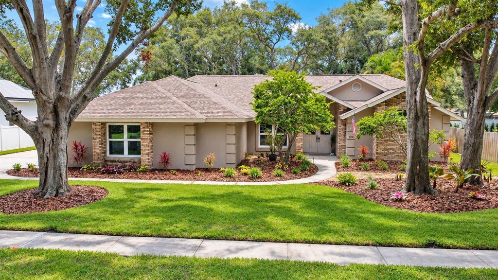 Photo of 9991 Windtree Boulevard, Seminole, FL 33772 (MLS # TB8546538)