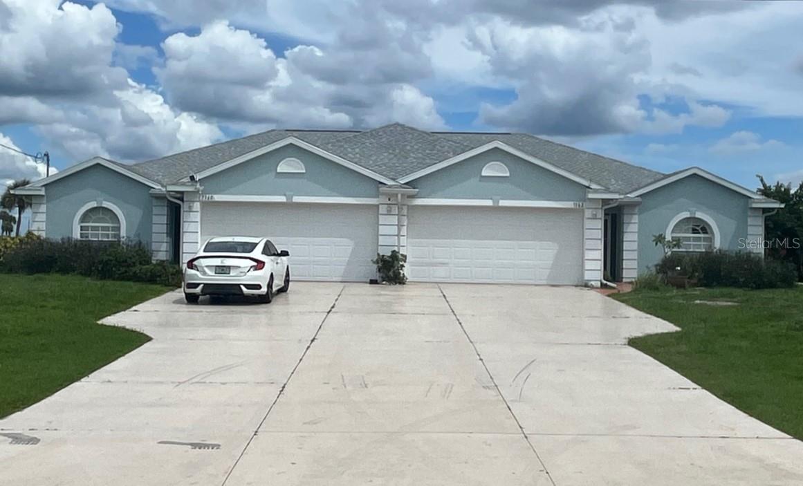 A unique opportunity to own a custom-built duplex with 2 car garages, 3 bedrooms, 2 bathrooms and 1,729 sq. ft. of living area on both sides. Perfect for two families or live on one side and rent the other side. It is on an oversite lot with the golf course on the back. Kitchen with solid countertop, pantry, bar high countertop and nook. A large master bedroom with a seating area, walking closet and tray ceiling. Master Bath has dual sinks, a walk-in shower, a jet tub and private toilet room. Independent laundry room under the A/C area and a utility closet. 2023 roof and per Charlotte County it is X flood zone, so NOT flood insurances is required. Enjoy the view of the golf course from your oversized screen lanai. Excellent location, only minutes to Boca Grande's and Englewood's white beaches, marinas, boat ramp, fishing, golf courses, restaurants, and shopping. It is a estate sale and is selling As- Is condition.
