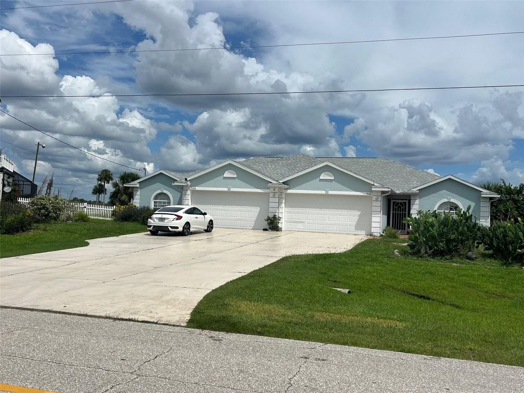 Photo of 7160 David Boulevard, Port Charlotte, FL 33981 (MLS # D6143650)