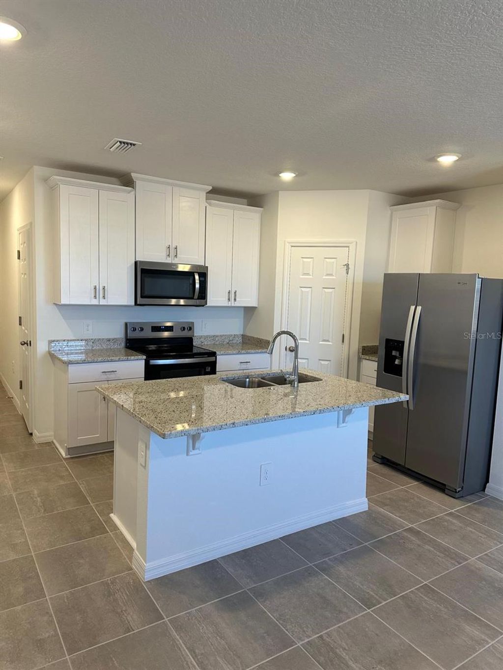 Photo of 16446 Bird Of Paradise Avenue, Clermont, FL 34714 (MLS # O6376298)