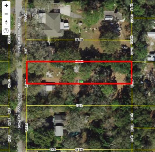 Build your dream home on this private residential lot in a quiet, wooded neighborhood. Measuring approximately 62x304, this property offers just under a half acre of space with plenty of room for a custom design, outdoor living, or a spacious yard. The location provides both privacy and convenience—tucked away in a natural setting yet only minutes from I-275, Busch Gardens, major hospitals, and shopping. Don’t miss this opportunity to create your ideal home in a central Tampa location.