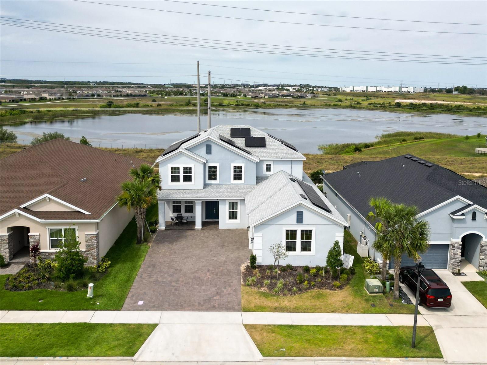STUNNING LUXURY LAKEFRONT HOME – WITH EXCEPTIONAL UPGRADES! NOW WITH AN IMPROVED PRICE!
Welcome to one of the most impressive and complete homes in Clermont, located in one of the fastest-growing and most desirable areas of Central Florida! This breathtaking two-story lakefront residence is a true showcase of elegance, comfort, and smart design, packed with high-end upgrades that exceed expectations.
Step inside and be amazed by the open-concept layout with luxury finishes throughout. The gourmet kitchen is a true centerpiece, featuring quartz countertops, a dramatic waterfall island, an integrated dining table, and panoramic lake views — the perfect setting for family meals and memorable gatherings.
Every space in this home was designed to balance togetherness and privacy. All bedrooms are generously sized, and the master suite has been fully upgraded with premium finishes, a spa-style bathroom, and spacious closets. The bathrooms throughout has designer tiles, custom cabinetry, and luxury fixtures, creating a serene, resort-like experience.
Step outside to your own backyard oasis: a fully upgraded summer kitchen, a heated 24x12 pool, and a 6x6 spa, all recently installed and ready for year-round enjoyment.
Perfect for growing families, this home is just minutes from Clermont’s main avenue, with quick access to supermarkets, top-rated schools, parks, shopping, and restaurants. The 3-car garage, extended driveway, and optional solar panel system (capable of powering three EVs) reflect a commitment to efficiency, sustainability, and future-forward living.
This is a true turnkey opportunity, combining luxury living, modern convenience, and one of Clermont’s most desirable lakefront locations — now at a reduced price and with the option to purchase fully furnished.
Don’t miss this rare opportunity to own one of Clermont’s finest lakefront homes, just had a significant price drop, making it even more attractive for buyers. Schedule your showing today and experience the perfect blend of luxury, lifestyle, and location!