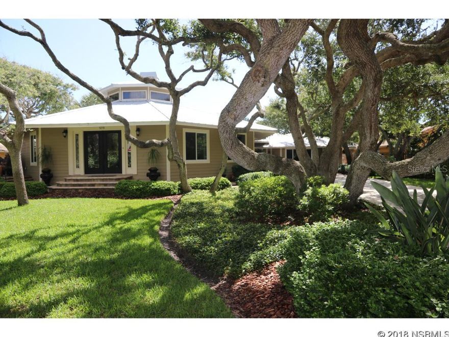 One of a kind octagon shaped home updated to perfection in 2016.  This unique home located on North Beach includes a stunning guest suite or game room attached via covered breezeway. Newly installed heavy duty, metal roof assures extended maintenance free service. One block to ocean & intercoastal. Oversized lot for area of 100âx125â. Home offers custom craftsmanship carpentry and top quality materials including travertine flooring, custom kitchen and bath cabinets all with granite counter tops. Ceilings are vaulted, cathedral, tongue and grooved cedar.  Guest suite or game room includes large bar area with mini fridge and sink, dual sink bathroom with walk in shower. Oak trees form a canopy over lush tropical landscaping perfect for enjoying the ocean breeze. ;Water: City