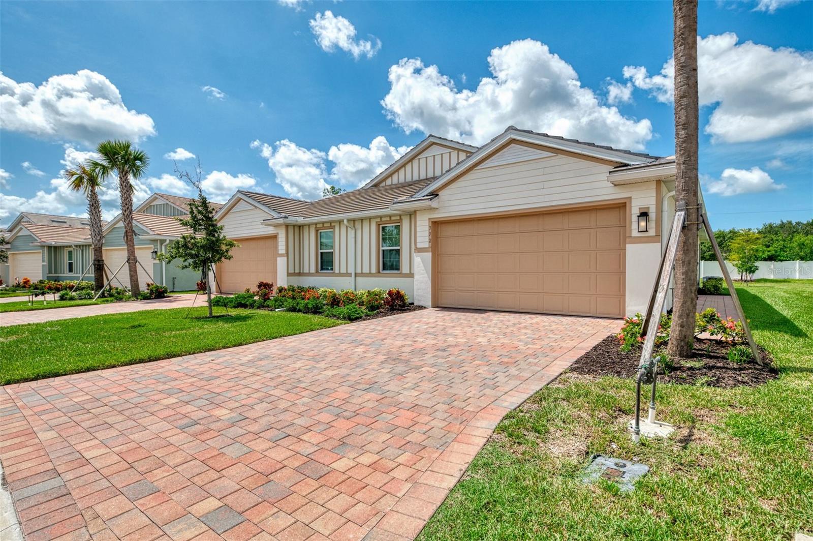 Welcome to this beautiful villa home in the desirable community of Palencia in North Venice! Low HOA dues plus NO CDD makes this home a great long term investment. This LIKE NEW villa home includes 2 bedrooms, 2 bathrooms PLUS a large den/office with glass French doors for additional flexibility and living space. Great features including ALL IMPACT windows, doors, and glass sliders for peace of mind and convenience. The full featured kitchen is stunning and includes quartz counters, under cabinet lighting, tile backsplash, stainless steel appliances, and slow closing cabinets with convenient pull out drawers for pots and pans. Tile plank flooring throughout all the main living areas, den, kitchen, and bathrooms. Quartz counters in both bathrooms as well. The primary bedroom is large with en-suite bath and walk in closet. PLUS a cozy back screened lanai to enjoy the wonderful Florida weather. Palencia is a great maintenance free community featuring lawn care PLUS a wonderful community pool with clubhouse and fitness. A convenient North Venice location with quick access to i75, shopping, and dining. Come and see this wonderful home today!