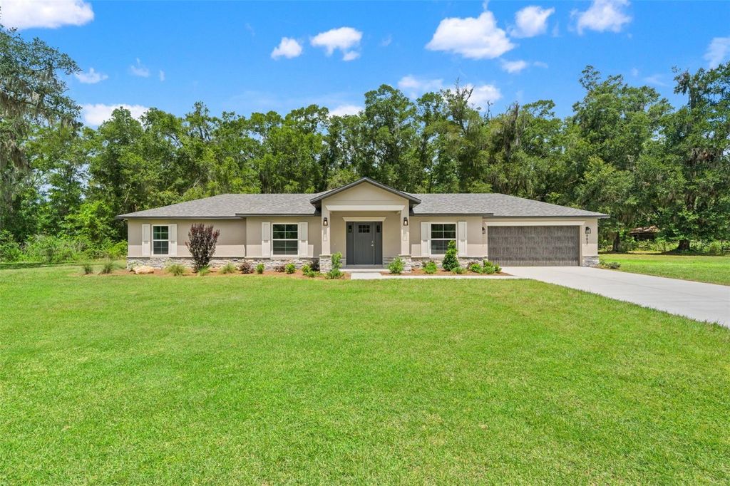 Photo of 983 Cardwell Street, Brooksville, FL 34602 (MLS # W7886889)