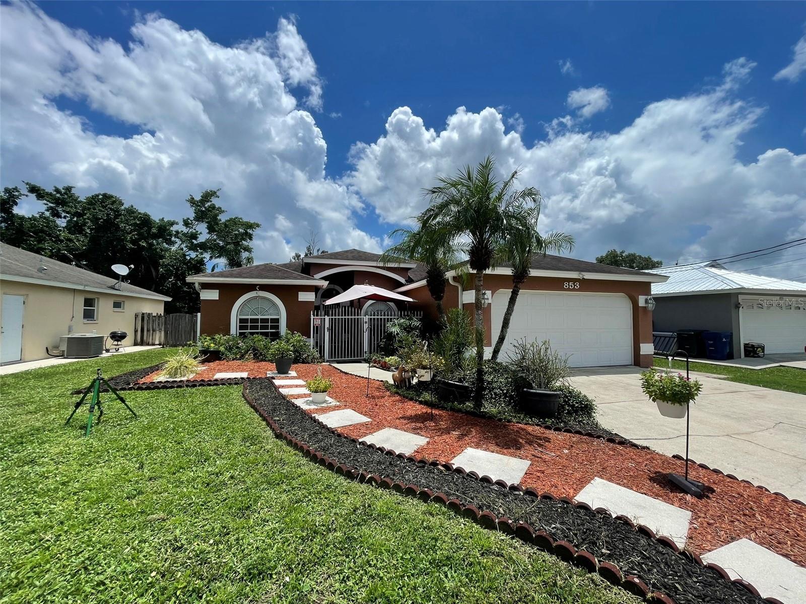 Spacious Home with In-Law Suite & Outdoor Oasis – No Deed Restrictions! This versatile single-family home offers over 2,200 sq ft under roof and includes a private in-law suite with its own entrance—ideal for multigenerational living or potential rental income. Truly there are many private spaces in this home. Located in a non-deed-restricted neighborhood, you'll enjoy the freedom to use your property your way, all while being conveniently close to schools, shopping, dining, and quick interstate access. The main residence features 2 bedrooms, a den, 1 full bathroom, a spacious living/dining room combo, and a large kitchen—perfect for entertaining or family gatherings. The guest quarters/in-law suite is generously sized and includes ample storage, a full bathroom, and a private entrance, offering comfort and independence for guests or tenants. Outdoor living is a dream with three special exterior spaces: a charming front porch, an oversized screened lanai, and a back patio with fire pit—all set within a private, fenced backyard filled with lush landscaping. A hot tub is included (not currently connected) for future enjoyment. This home may also be purchased on a lease purchase, lease option, and possible owner financing and is also listed for sale however will be terminated in MLS if rented first.