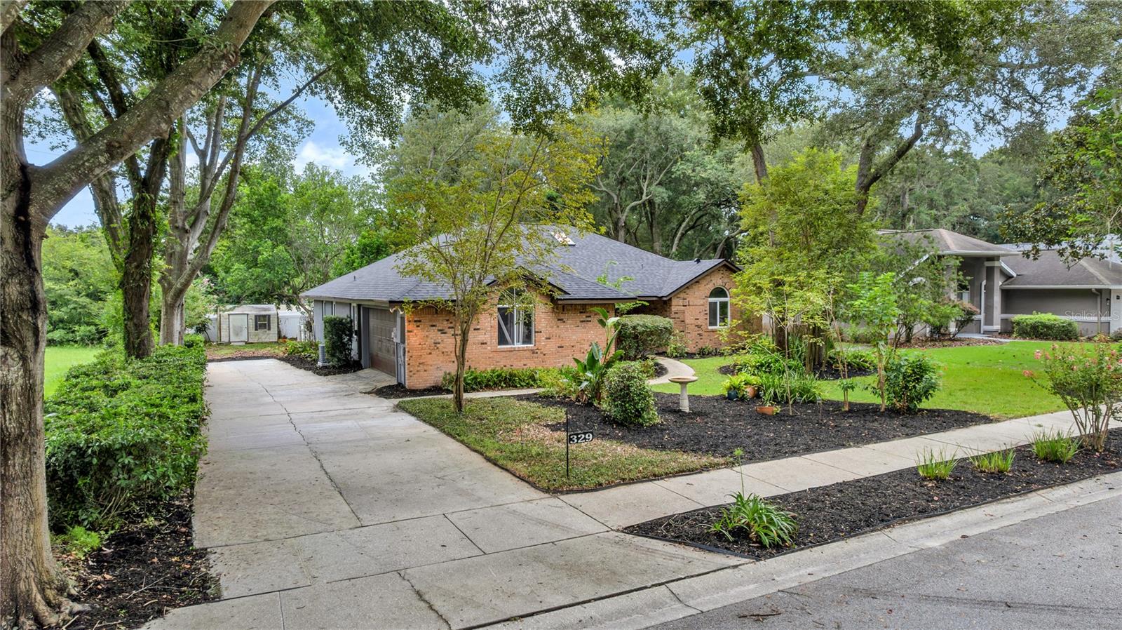 329 SUN OAKS COURT