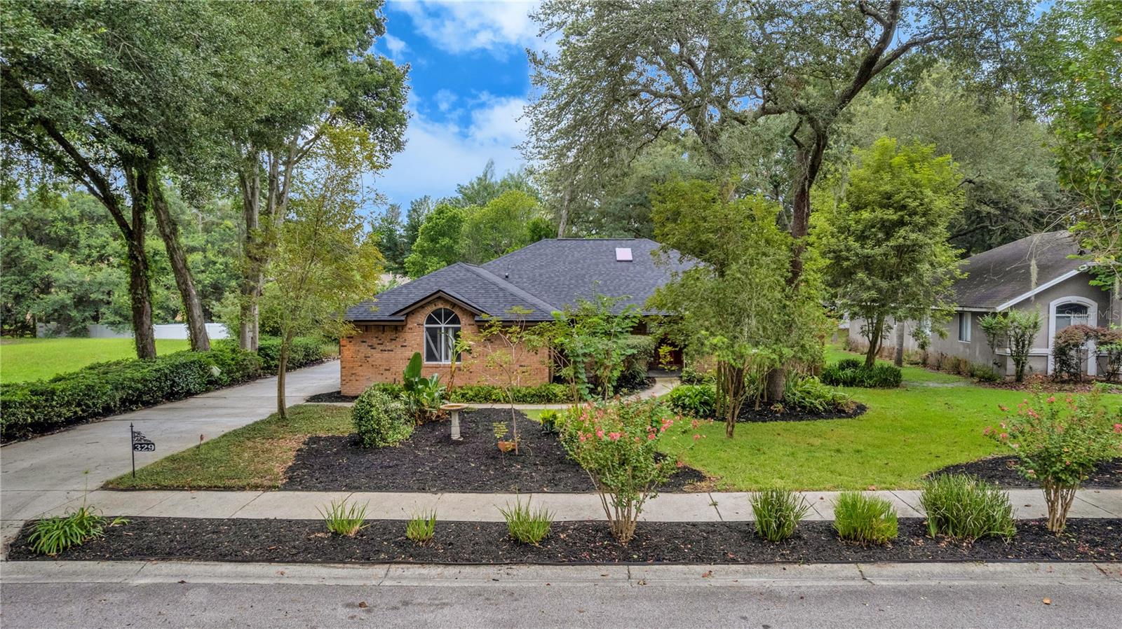 329 SUN OAKS COURT
