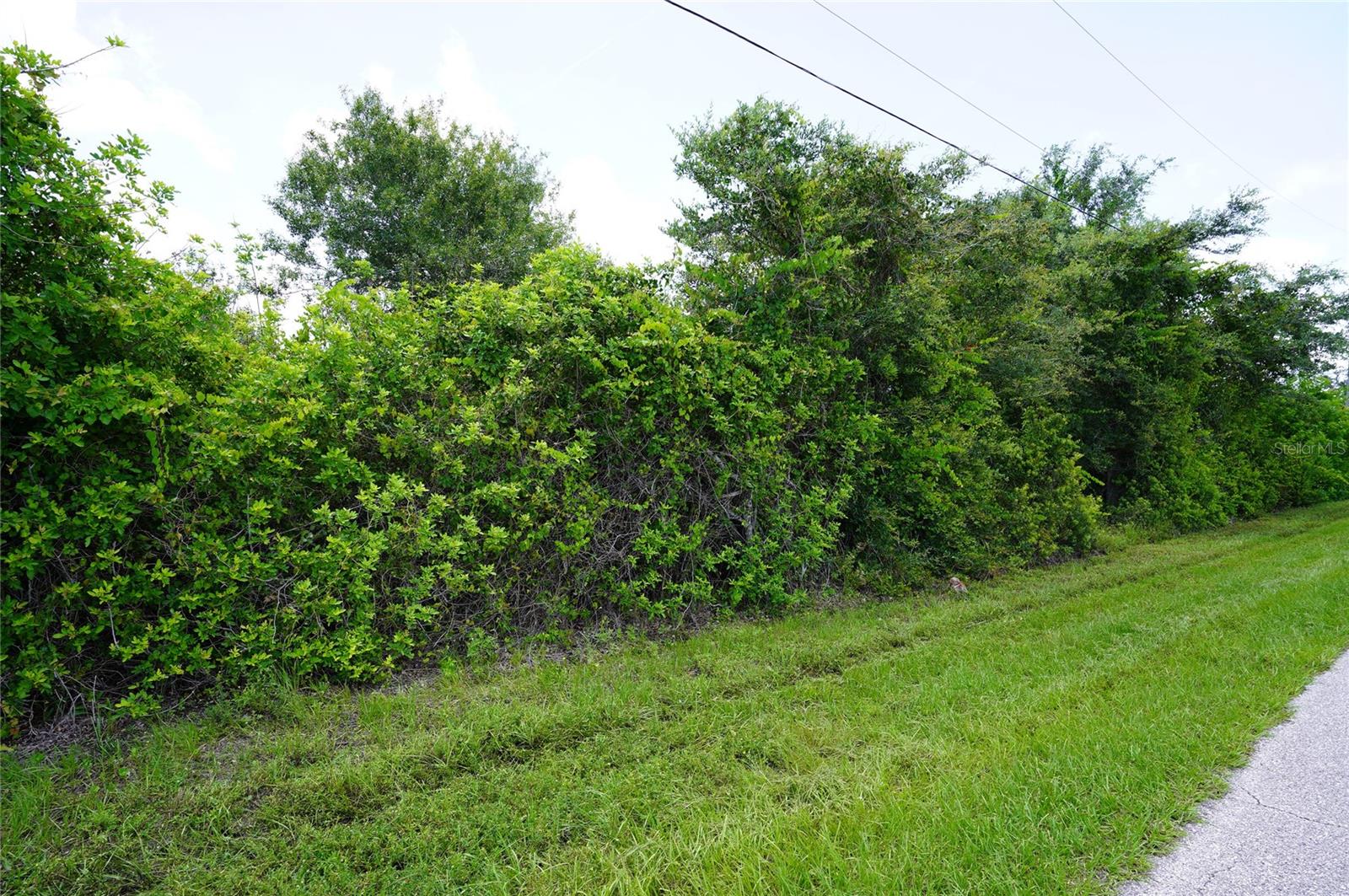 Zoned: Multi Family 10 Units / Acre - Rmf10 Lot.
17,231 Lot Sq ft. = 0.3956 Lot acres Type: Res Lot.
Sold as is or can be sold with building plans for a Triplex.
Local amenities, beaches, and Tiki Bars and Live entertainment daily. The best Tarpon and red game fishing in the world with off speed boat racing to spring training baseball teams as The Atlanta Braves and Tampa Rays baseball teams. Just want to go to the local beaches (Port Charlotte, Boca Grande, Englewood and Sarasota beaches) or fishing for the day. Great to do it all with whatever you can dream or do as a hobby. Local International Airports: Fort Myers, Sarasota and local Punta Gorda with Allegiant airlines direct. Many outdoor concert venues weekly. Many local Tiki Clubs watch live entertainment to have a Sunset view. Local parks, state parks, tennis or pickleball, to amazing golf courses. You deserve to view this property and make it your home or investment. You even have room to add or build a new pool. Scrub jay free. No permit needed.