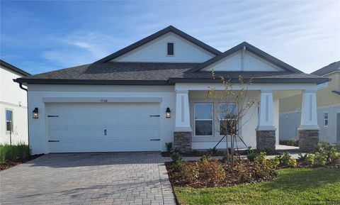 Photo of 5540 Maydale Avenue, Wesley Chapel, FL 33545 (MLS # J996409)